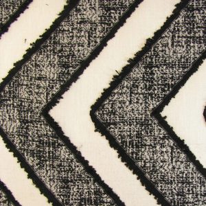 Ubuntu E5131-01, Exclusieve, doorschijnende gordijnstof met een ingeweven zigzag patroon met franjes aan de randen. | Effabrics.nl